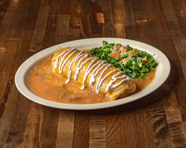 Smothered breakfast burrito.